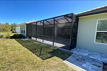 Patio with bronze gable screen enclosure by East Coast Aluminum